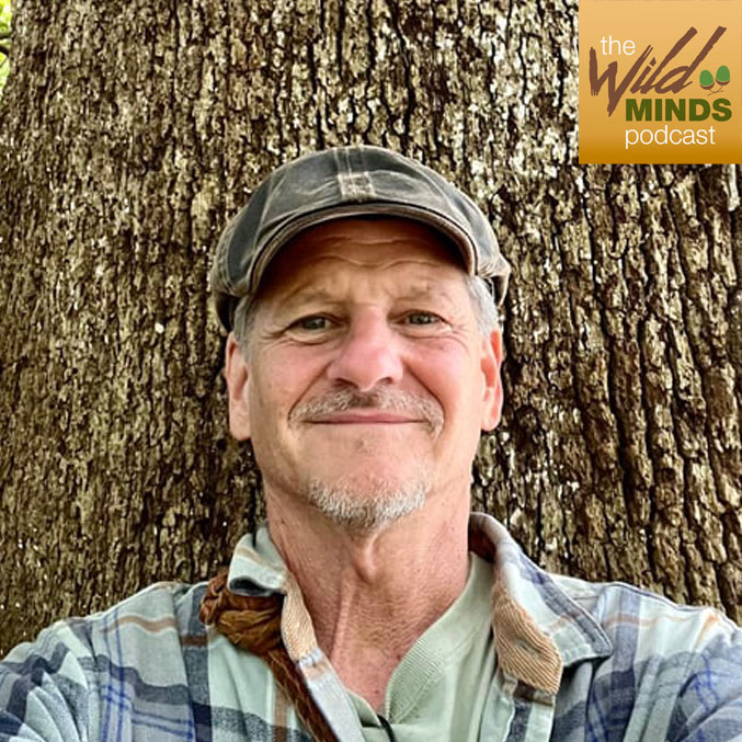Jon Young Podcast Jon Young leaning on a tree