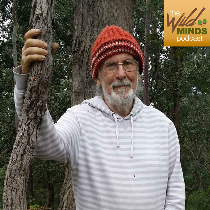 John Seed Podcast John Seed next to a tree